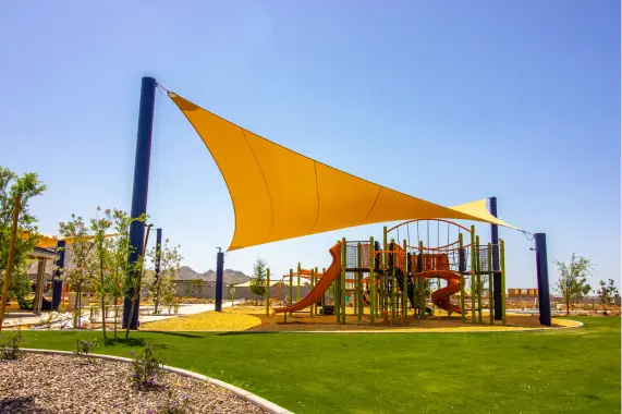 Colorful playground equipment and shade structure